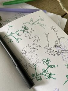 Sketchbook covered in doodles