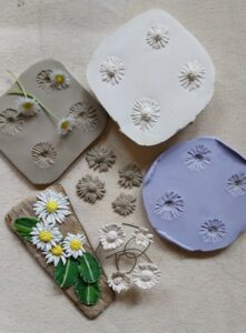 examples of clay casting with daisies